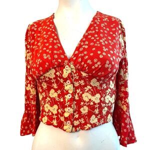 Free People XS Orange Cropped Floral Blouse Button V Neck Smocked Bell Sleeve